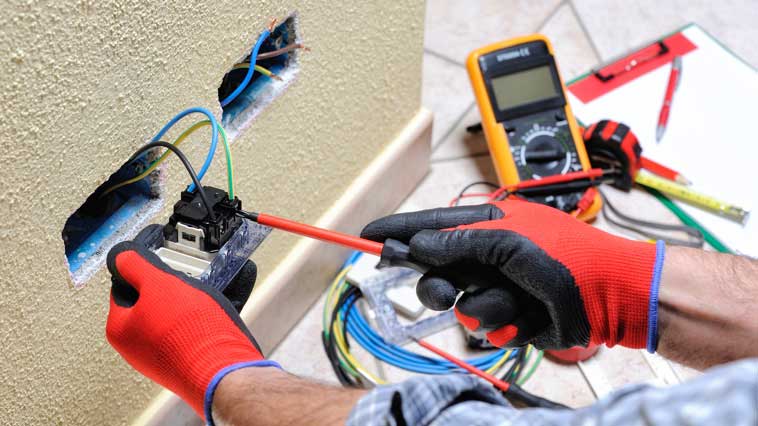 Electrician replaces electrical wiring and equipment using hand tools. 