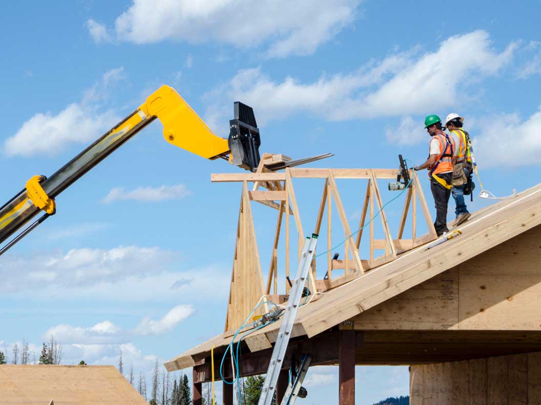 Carpenters erect and install building framework using rigging cranes. 
