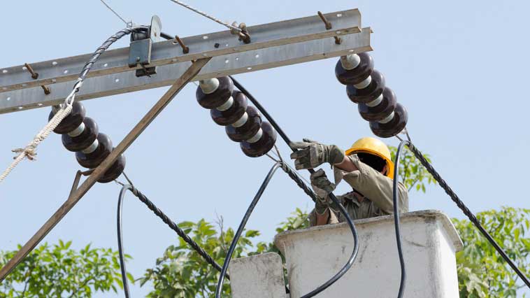 Power-line repairer works on wiring power-line insulators. 